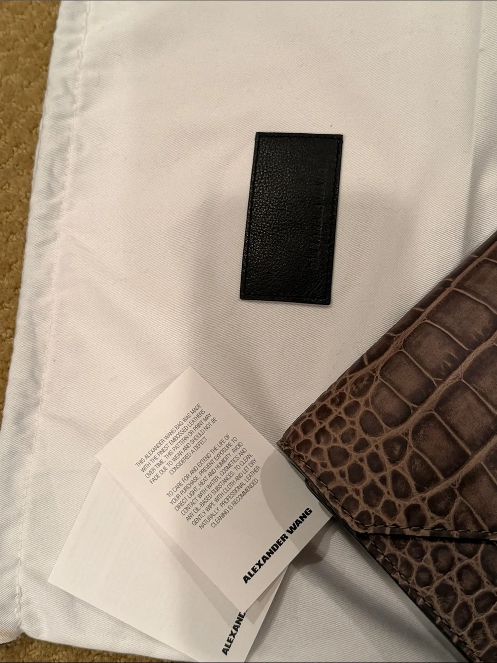 Alexander Wang women’s -Embossed Leather Envelope clutch in Taupe Gray